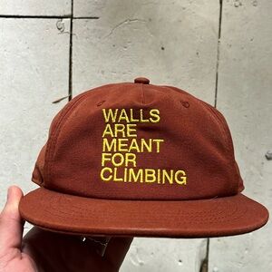 The North Face burnt orange walls are meant for climbing hat.
